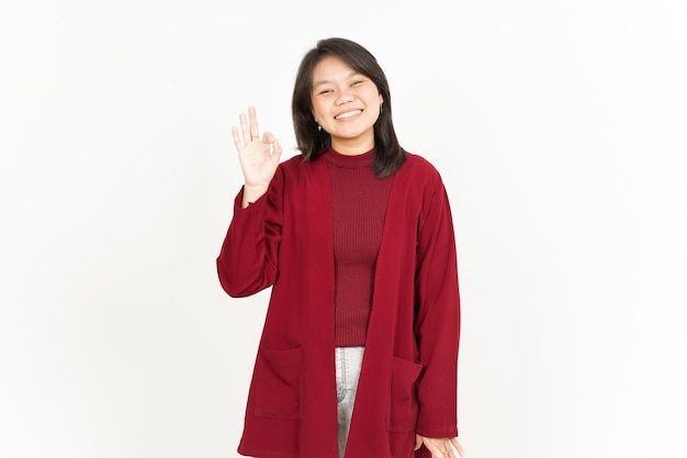 Showing Ok Sign Of Beautiful Asian Woman Wearing Red Shirt Isolated On White Background