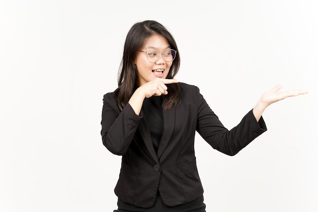 Showing and Presenting Product on Open Palm Of Beautiful Asian Woman Wearing Black Blazer