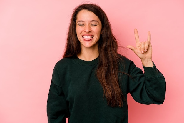 Showing rock gesture with fingers