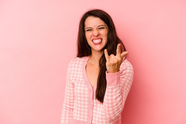 Showing rock gesture with fingers