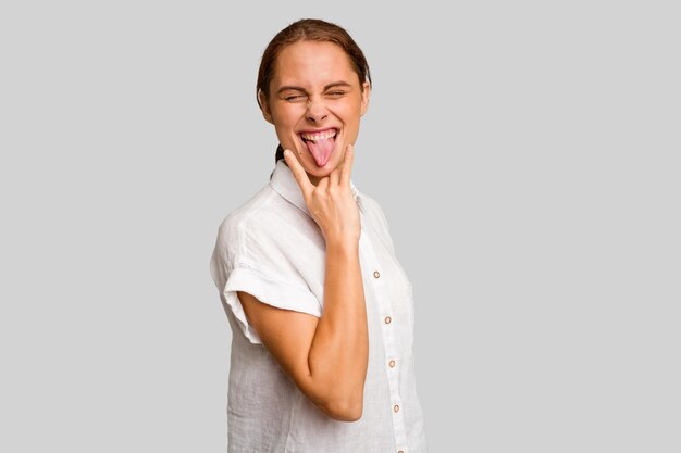 Showing rock gesture with fingers