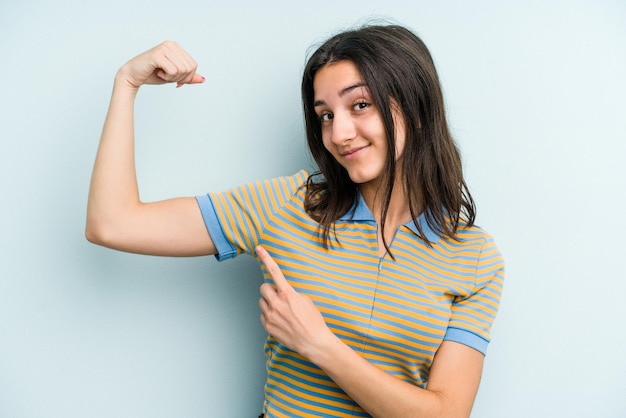 Showing strength gesture with arms symbol of feminine power