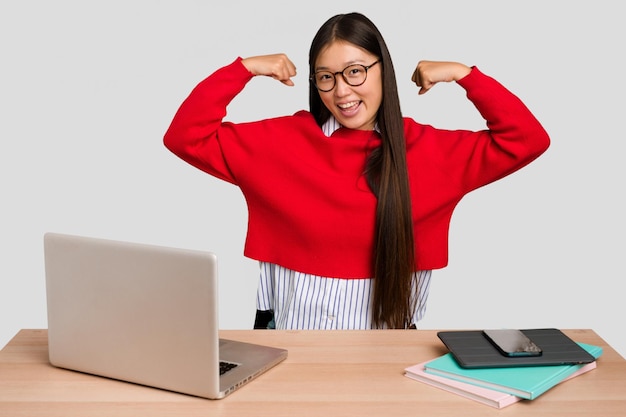 Showing strength gesture with arms symbol of feminine power