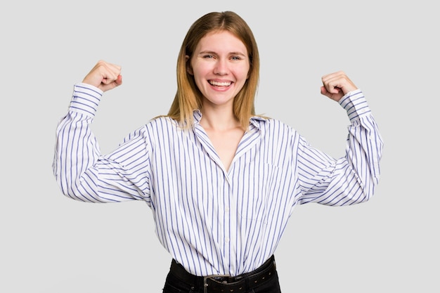 Showing strength gesture with arms symbol of feminine power