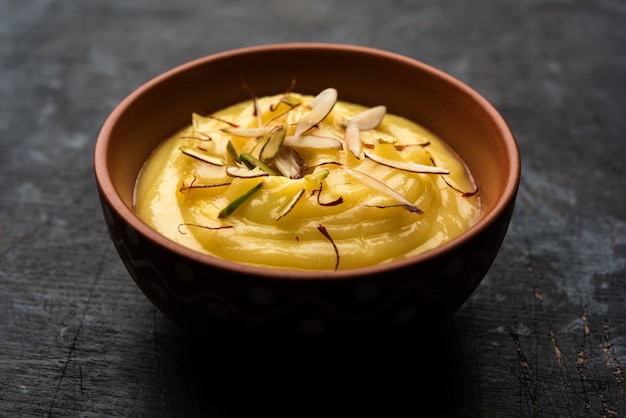 Shrikhand OR Srikhand is an Indian dessert made of strained yogurt, garnished with dry fruits and saffron.