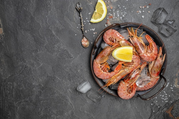 Shrimps prawns Seafood Red Argentine shrimps with ice Wild shrimps ocean jumbo shrimps banner menu recipe place for text top view