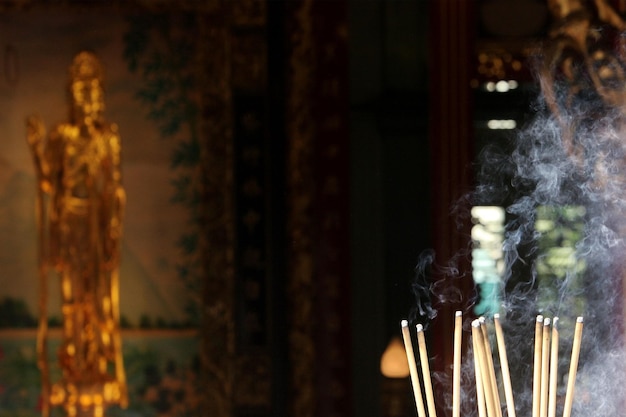 Shrine with incense and smoke