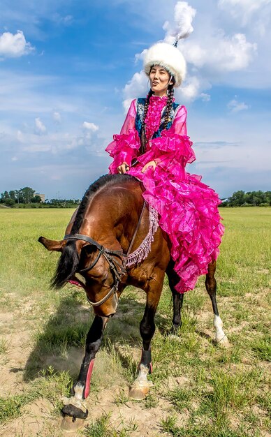 Shymkent Kazakhstan May 16 2018 A holiday at the city hippodrome in honor of the beginning of the Holy month of Ramadan Girls in national costumes on horseback