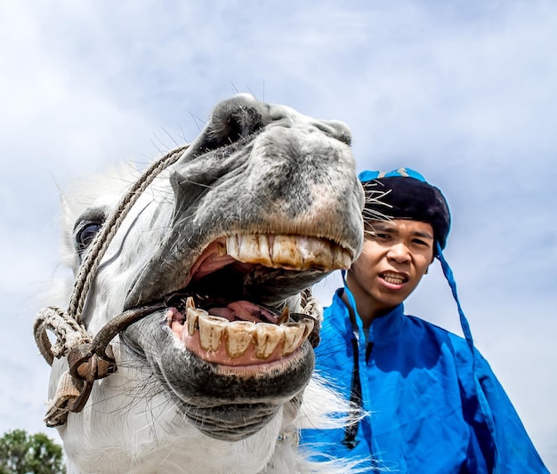 Shymkent Kazakhstan May 16 2018 A holiday at the city racetrack in honor of the beginning of the Holy month of Ramadan Riders in national costumes on horseback