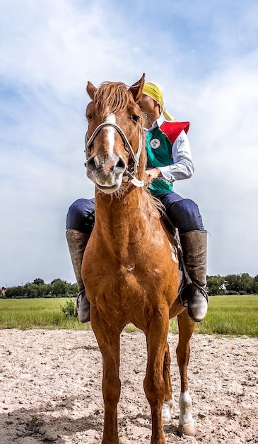 Shymkent Kazakhstan May 16 2018 A holiday at the city racetrack in honor of the beginning of the Holy month of Ramadan Riders in national costumes on horseback