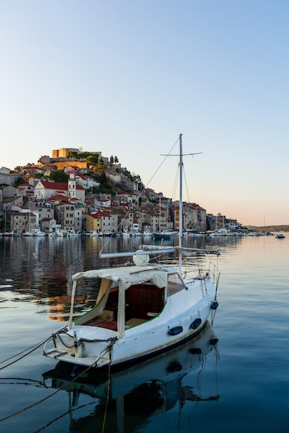 Sibenik Croatia a small sea vessel is moored off the coast