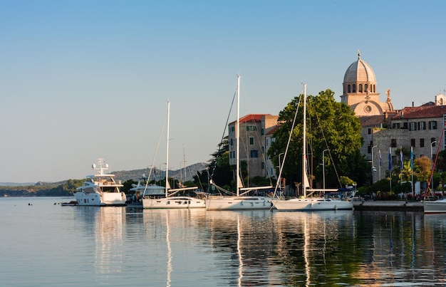 Sibenik Croatia a small sea vessel is moored off the coast