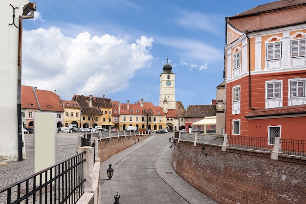 Sibiu city downtown with houses a bridge and a tower with clock, Romania