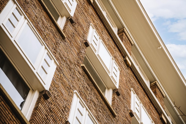 The side of a brick building with windows