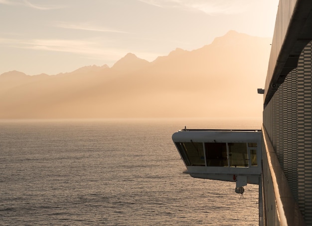 Side of cruise ship sailing to Milford Sound