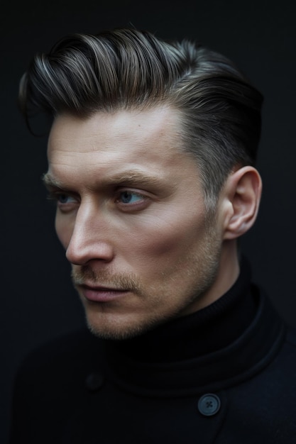 Side profile of a man showcasing a trendy slickedback undercut hairstyle