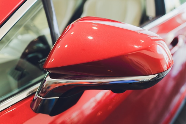 Side rear-view mirror on a modern car.