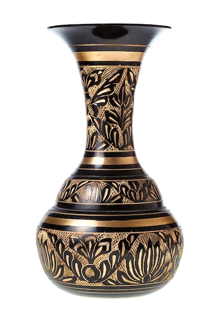 Side view of carved brass indian vase isolated