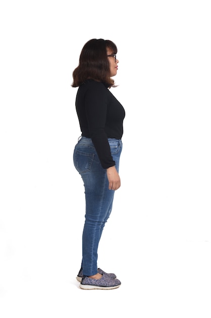 Side view of a full portrait of a latin woman on white background