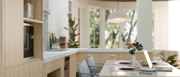 Side view of a modern contemporary kitchen with kitchen appliances and dining table