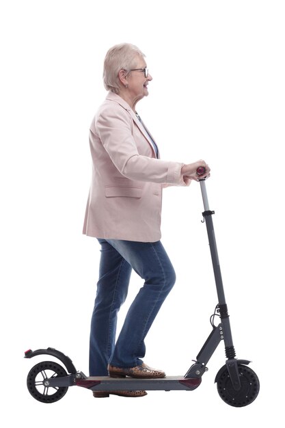 Side view modern elderly woman with electric scooter