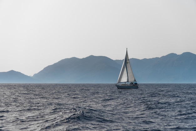 Side view of yacht floating in the sea