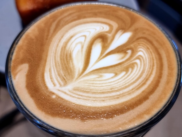 Sideway shop coffee closeup hot latte art coffee background