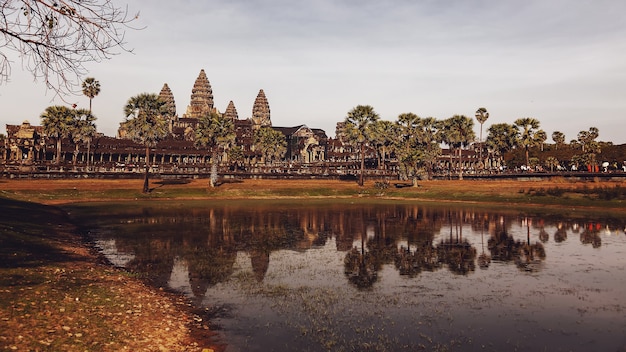 Siem Reap, Cambodia, february 2014: Some people tourist on Stone ruins of Angkor Wat temple complex largest religious monument and UNESCO World Heritage Site