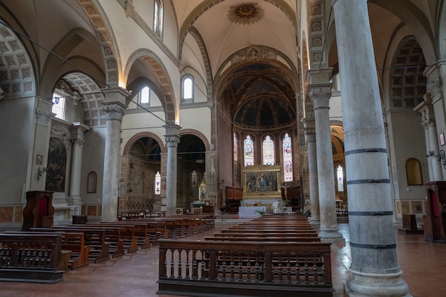 Siena, Italy - June 28, 2018: Panoramic view of interior of Santa Maria dei Servi s a Romanesque style, Roman Catholic church in the Terzo of San Martino in the city of Siena, Tuscany