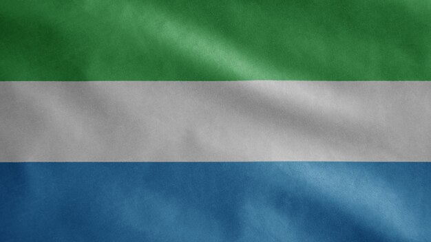 Sierra Leone flag waving in the wind. Close up of Salone template blowing, soft and smooth silk.