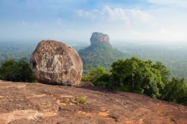 Sigiriya Rock or Sinhagiri or Lion Rock aerial panoramic view from Pidurangala Rock near Dambulla in Sri Lanka