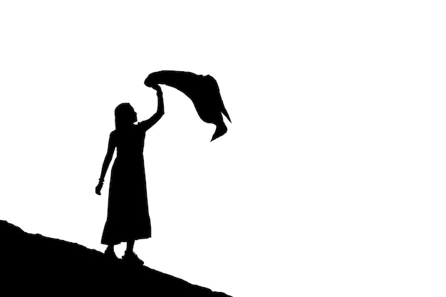 Silhouette asian woman standing waving the cloth blowing on background