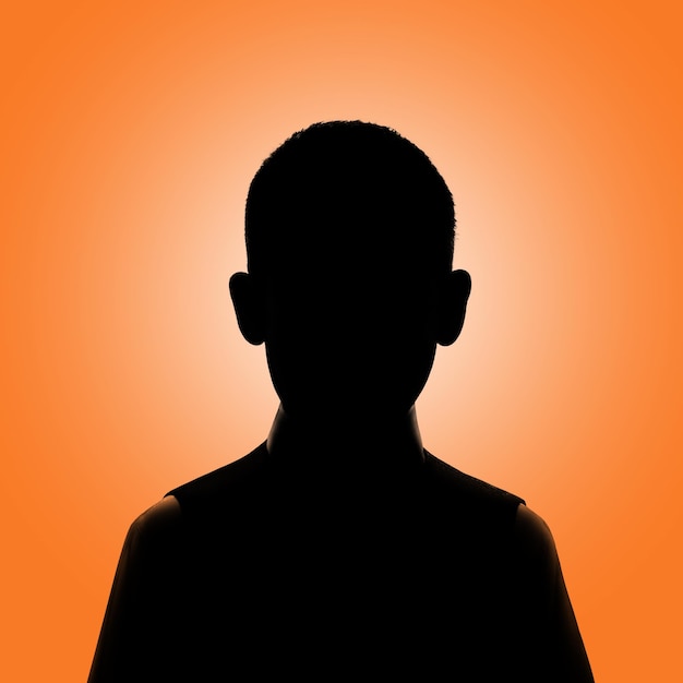 Silhouette of a boy Boy's avatar Boy posing on orange background