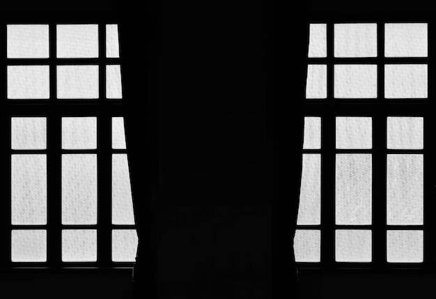 Photo silhouette building seen through window