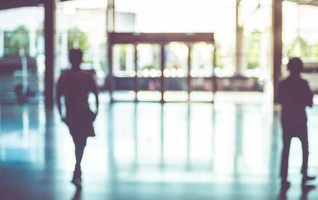 silhouette of Business man walking at corridor