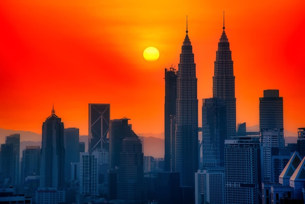 Silhouette Cityscape of Kuala lumpur city skyline at sunrise in Malaysia.