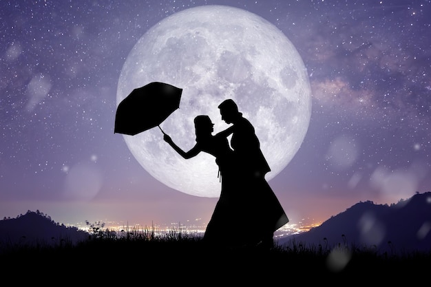 Silhouette of Couple Lover Relationship at night landscapexA