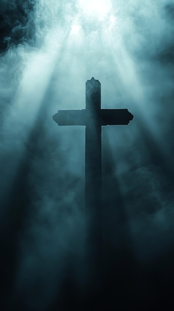 Photo silhouette of cross in misty light