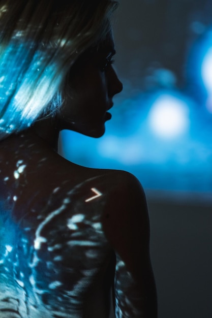 Silhouette female portrait Spiritual energy Peace soothing Nature unity Mysterious fantasy Beautiful naked woman with blur lights reflection isolated on dark lens flare double exposure