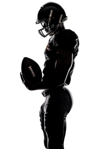 Silhouette of a football player holding a ball dressed in black uniform against a white background