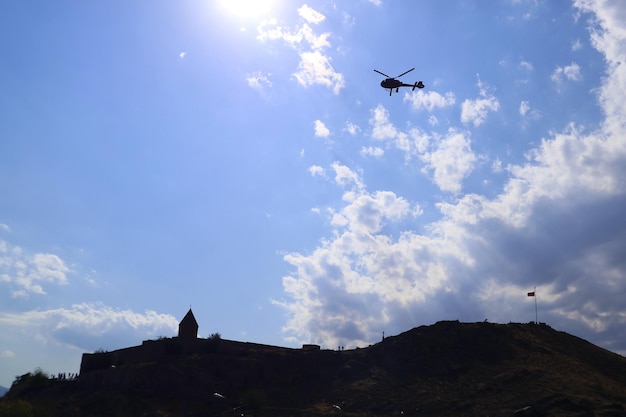 Silhouette of Helicopter for Sightseeing Flying over Khor Virap Monastery Armenia