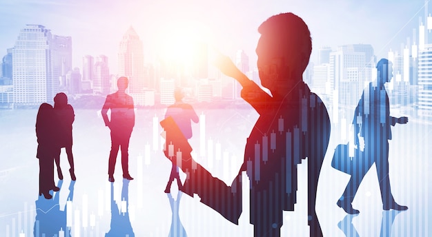 Silhouette image of business people group on city background