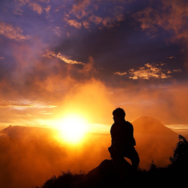 silhouette of man at beautiful sunrise