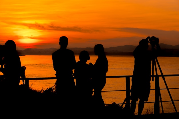 Silhouette of people doing activities at the scenic area