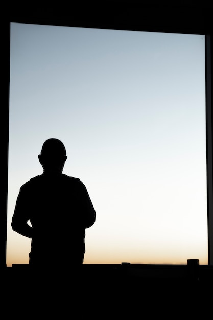 Silhouette of person in the city