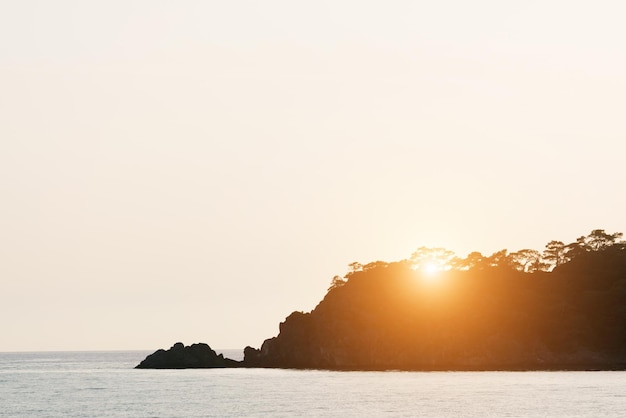 Silhouette of a rocky coast at sunset