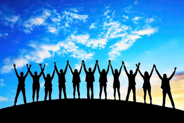 Photo silhouettes of group people men and women standing in celebration their victory at sunset