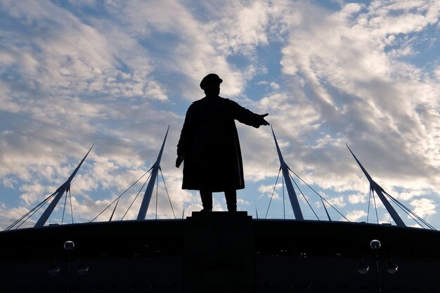 Silhouettes of monument to Kirov with stadium ZenitArena on Kristovsky island