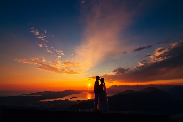 Silhouettes at sunset on mount lovcen