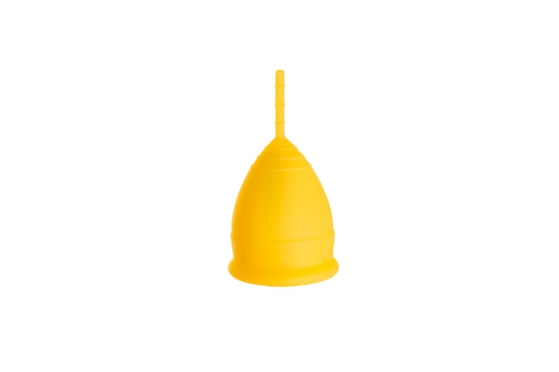 Silicone yellow menstrual cup on isolated white background ecofriendly Alternative reusable product